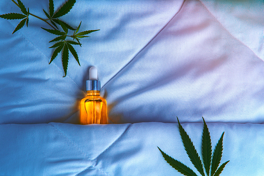 CBD Oil Tucked Into Bed